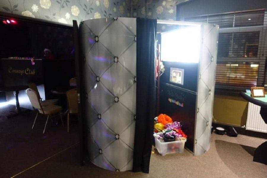 Enclosed photo booth set up at an event